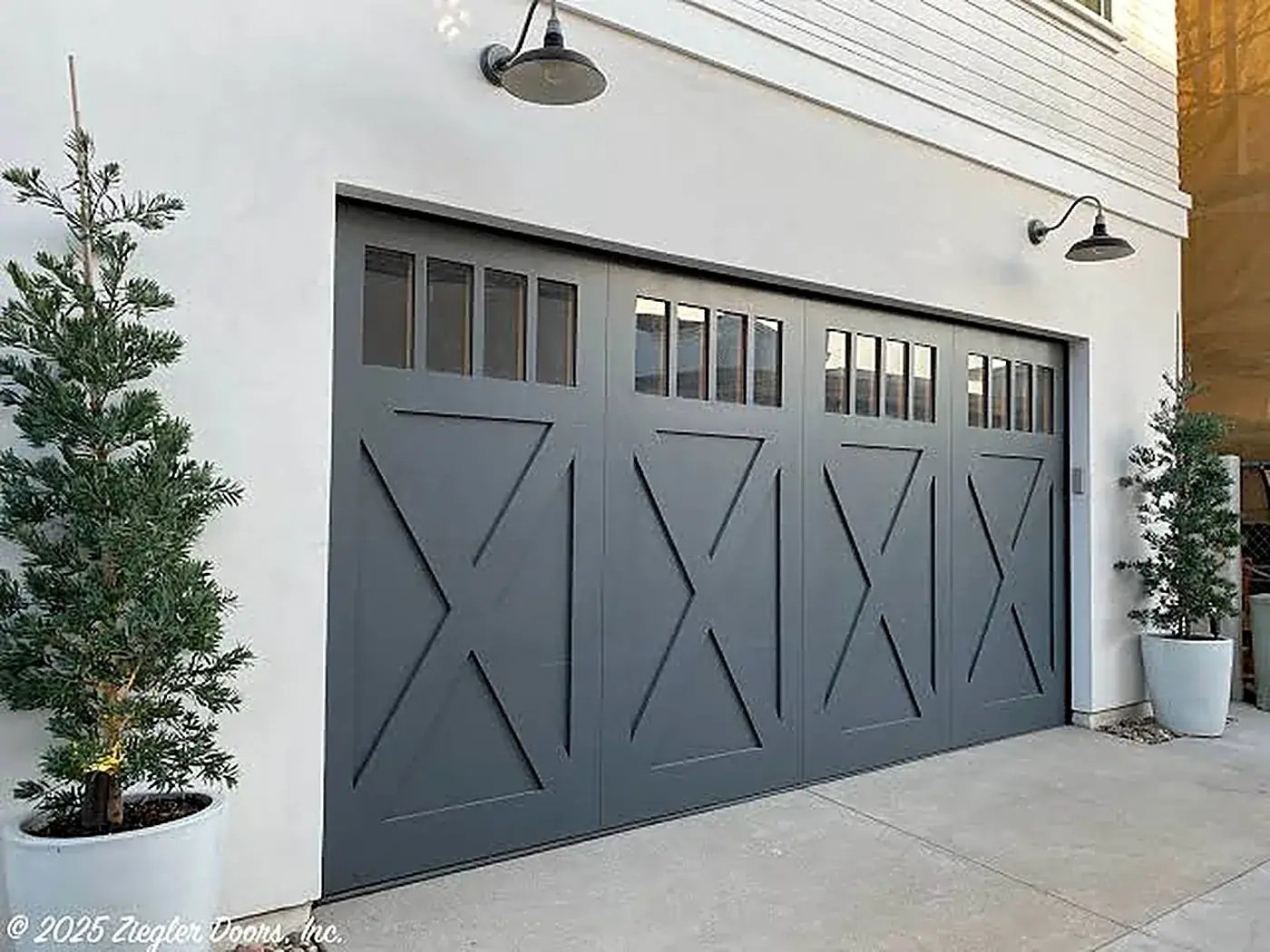 Grey sectional garage doors on a Gauteng home repaired by Clearpath