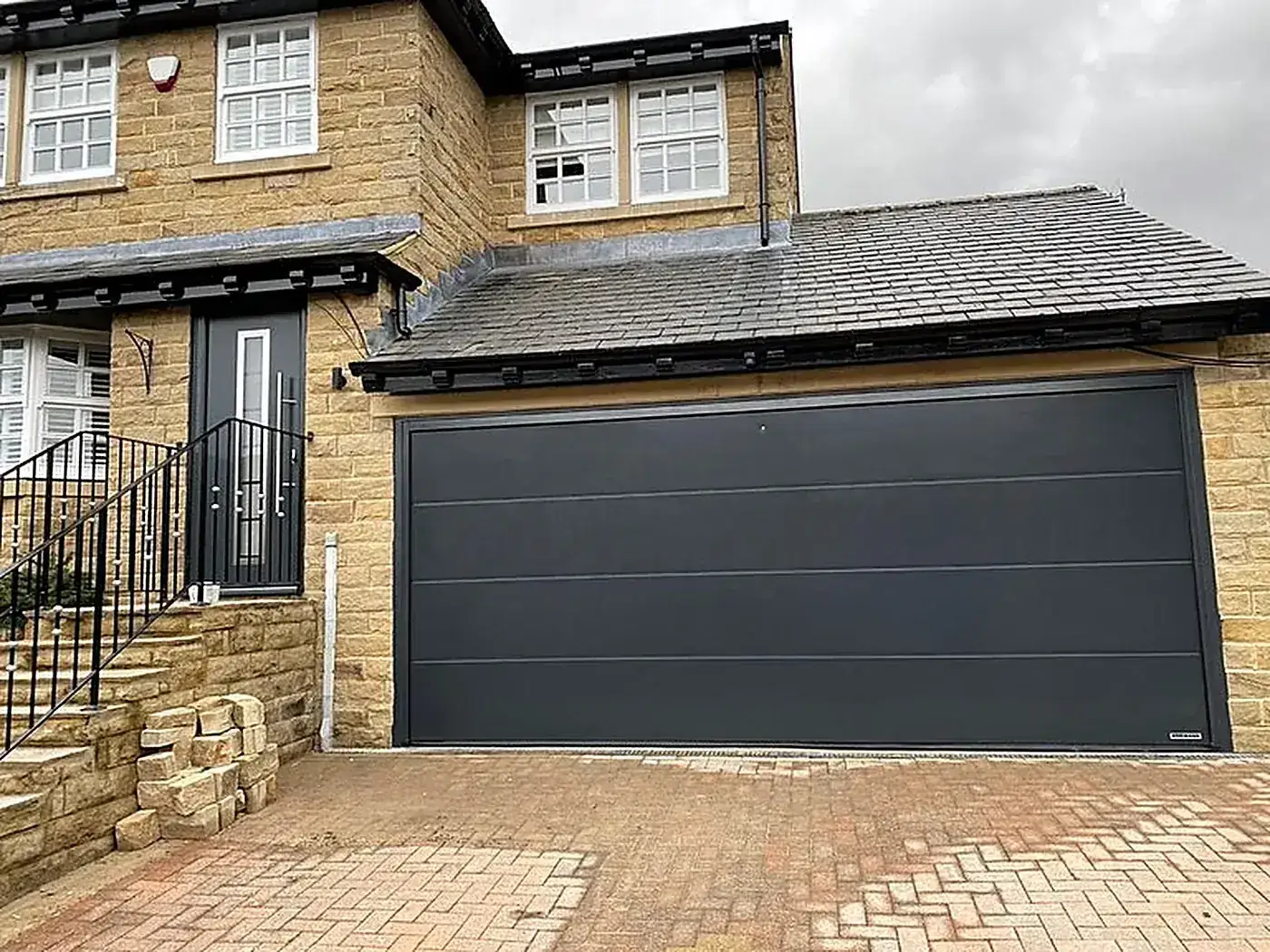 Well-maintained sectional garage door on a Gauteng home