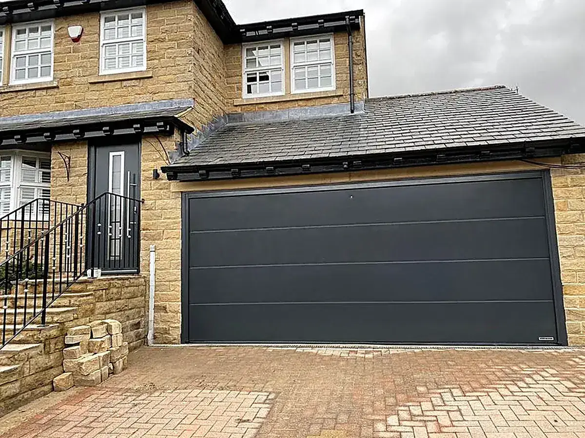 New sectional garage door fitted to a home in Tembisa