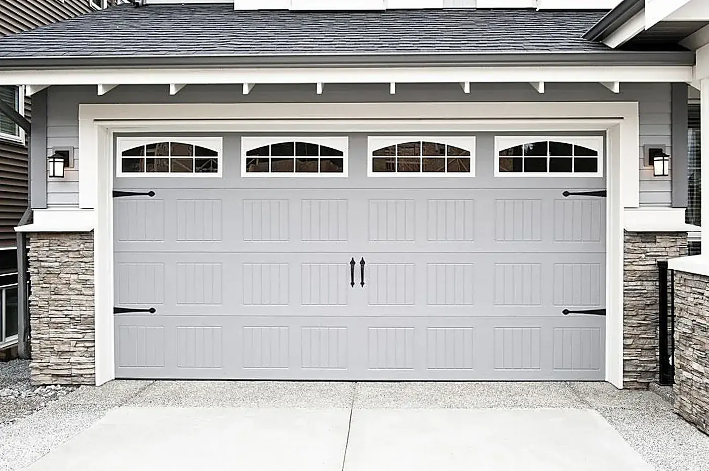 New white sectional garage doors fitted to a double garage in Gauteng