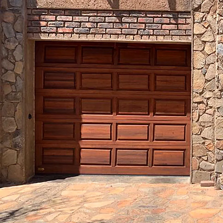 Wooden garage door on a Vereeniging home requiring regular sealing